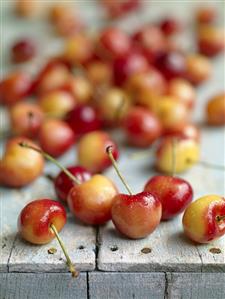 White Cherries on a Blue Crate