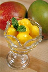 Mango Balls in a Glass Dish, Fresh Mangos