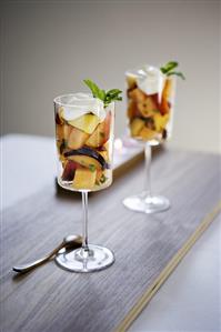 Two Stem Glasses of Fruit Salad with Mint Garnish