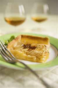 Piece of Pear Tart on a Plate with Fork