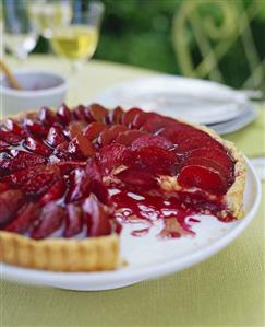 Plum Tart with a Slice Removed