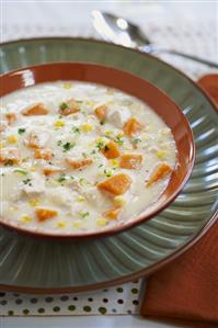 A Bowl of Clam Chowder with Carrots