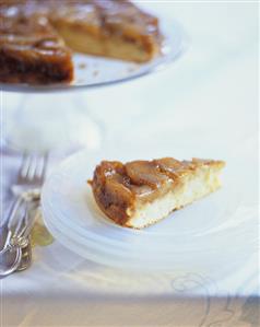 Slice of Tarte Tatin on Stacked Plates