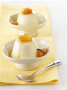 Two Bowls of Pannacotta with Citrus Sauce