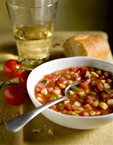 Bowl of Gazpacho with Spoon; Bread