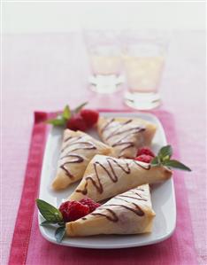 Raspberry Turnovers with Chocolate Sauce