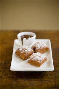 Banana Coconut Beignets with Chocolate Ganache Sauce