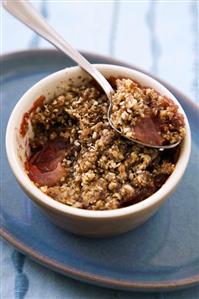 Plum Crumble in Individual Baking Dish; Spoon