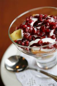 Fruit Salad with Wild Oat Honey, Pomegranate and Black Currant Coulis