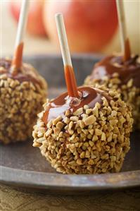 Nut Coated Caramel Apples on Dish