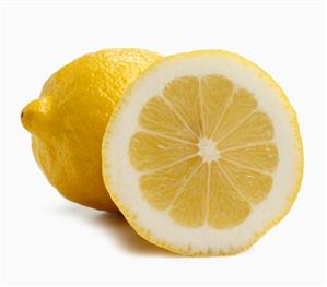 Half and Whole Lemon on White Background