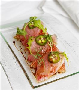 Hamachi Crudo; Fresh Slices of Raw Japanese Amberjack Topped with Grapefruit and Jalapeno