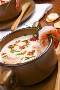 Bowl of Shrimp Chowder with Fresh Chive Garnish