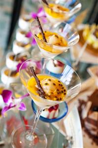 Vanilla Ice Cream with Passion Fruit Sauce in Martini Glasses