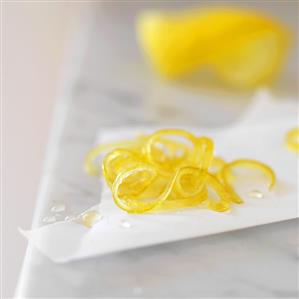 Candied Lemon Peel Drying on Parchment Paper