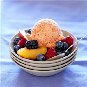 Nectarine Sorbet with Peaches and Berries in Stacked Bowls