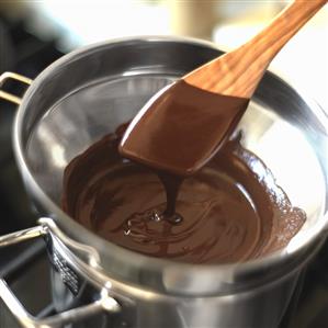 Melting Chocolate in a Double Boiler; Wooden Spoon