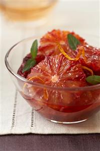 Blood Orange Slices with Mint in a Glass Bowl