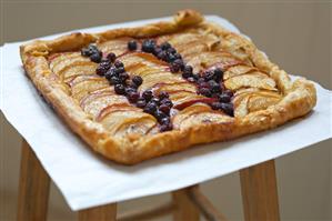 Peach and Blueberry Tort on Parchment Paper