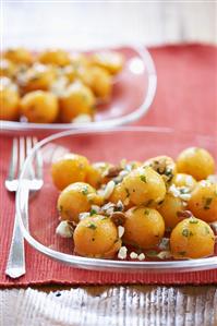 Canataloupe Salad with Walnuts on Glass Plate