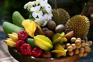 Exotic fruit with Frangipan flower. Bali (Indonesia)