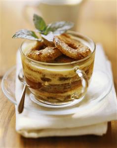 Scheiterhaufen (bread pudding) with apple slices in glass