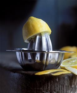 Half of a Lemon on a Juicer