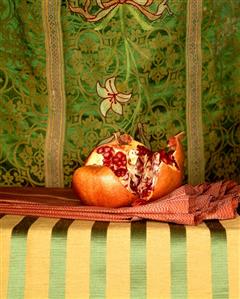 A Pomegranate with Asian Linens