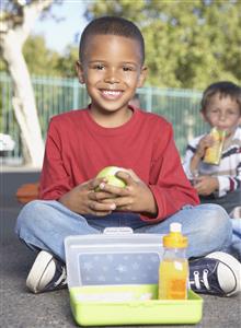 Students outside of school eating