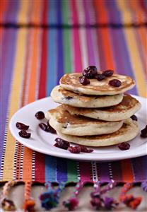 Blinis con arandanos. Receta disponible.