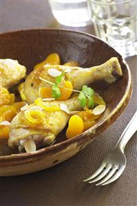 Tajine de pollo con mandarinas. Cocina africana. Receta disponible.
Chicken with Tangerines Tagine.  African Cuisine.