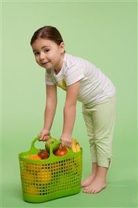 Girl with a basket of fruit