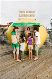 Family at lemonade stall