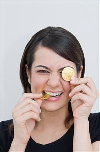 Woman with chocolate coins