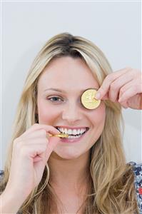 Woman with chocolate coins