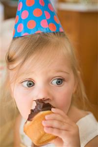 Little girl with a cupcake