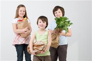 Children with groceries