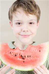 Boy with slice of watermelon