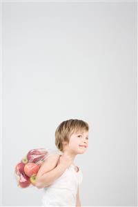 Boy with bag of apples