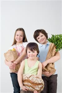 Children with groceries