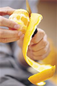 Peeling an orange