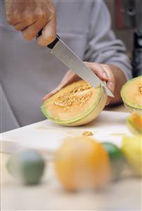 Cutting a melon