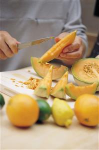 Cutting a melon