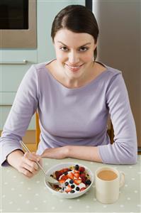 Woman having breakfast