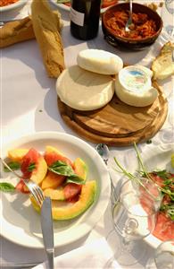 Cheeses and melon slices