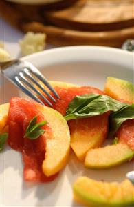 Smoked salmon with melon