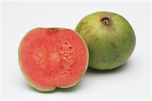 One and a half pink guavas