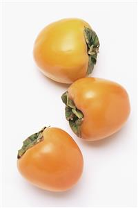 Three persimmons